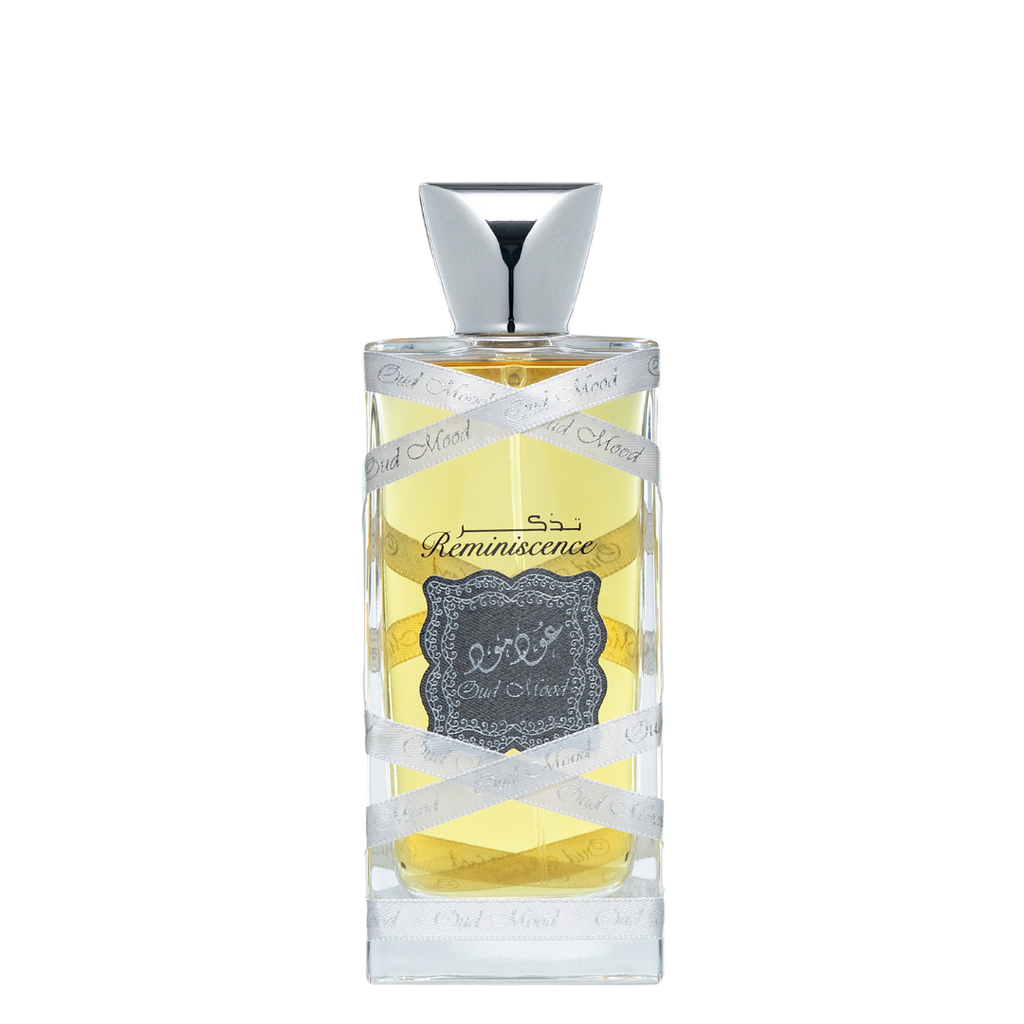 A bottle of Oud Mood Reminiscence Perfume with a clear, golden liquid visible and a label that reads 'Reminiscence' along with some decorative elements. Lattafa Oud Mood Reminiscence Unisex Perfume