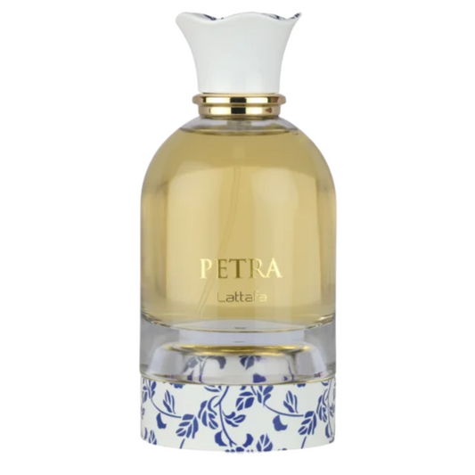 Perfume bottle labeled 'Petra' with a decorative base on a white background. Lattafa Petra Unisex Perfume.