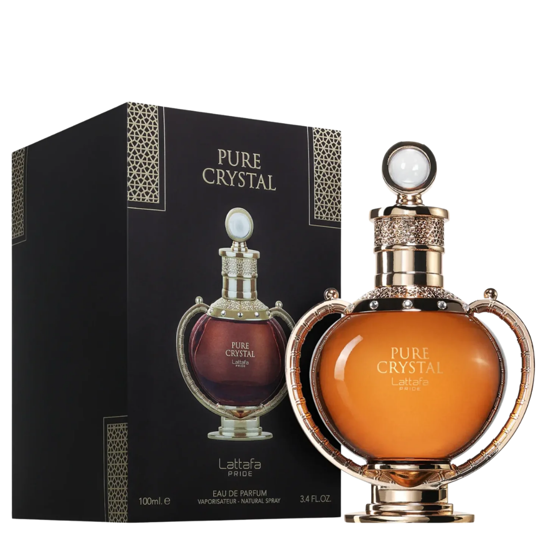 Lattafa Pure Crystal Eau de Parfum bottle with amber-orange liquid and ornate gold detailing, shown next to its black packaging box with gold lettering.
