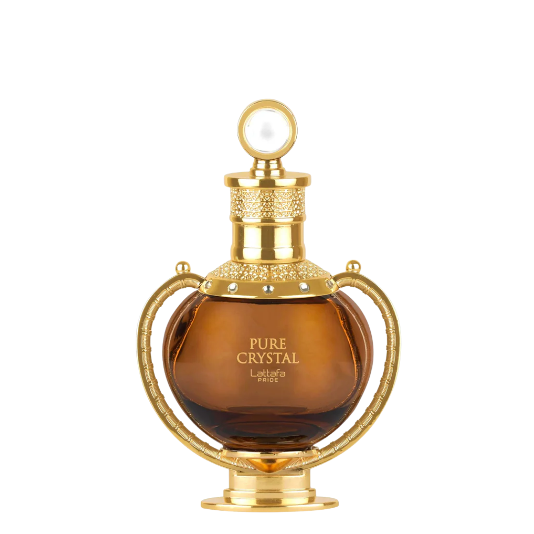 A luxury perfume bottle with a round amber-brown glass body, ornate gold metal frame, and a gold cap topped with a white pearl, labeled 'PURE CRYSTAL' by 'Lattafa Pride'.