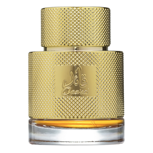 A luxurious gold-colored perfume bottle with a textured cap and the brand name 'Lattafa' displayed prominently. Clone / dupe of / inspired by Dolce & Gabbana - Velvet Desert Oud perfume. Qaa’ed by Lattafa golden perfume bottle with intricate textured design, placed alongside premium black and gold packaging, representing Middle Eastern luxury scents.