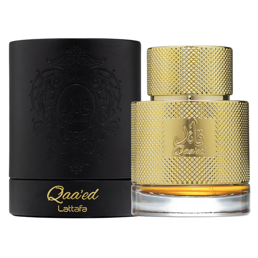 A luxurious gold-colored perfume bottle with a textured cap and the brand name 'Lattafa' displayed prominently. Clone / dupe of / inspired by Dolce & Gabbana - Velvet Desert Oud perfume. Lattafa Qaa’ed Eau de Parfum – luxurious men’s fragrance in an opulent gold textured bottle with black embossed packaging, showcasing Arabic calligraphy and oriental elegance.