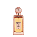 A rectangular bottle of Lattafa Queen of Roses perfume with a textured rose gold cap and a glittery rose gold frame, containing amber-colored liquid, set against a plain white background.
