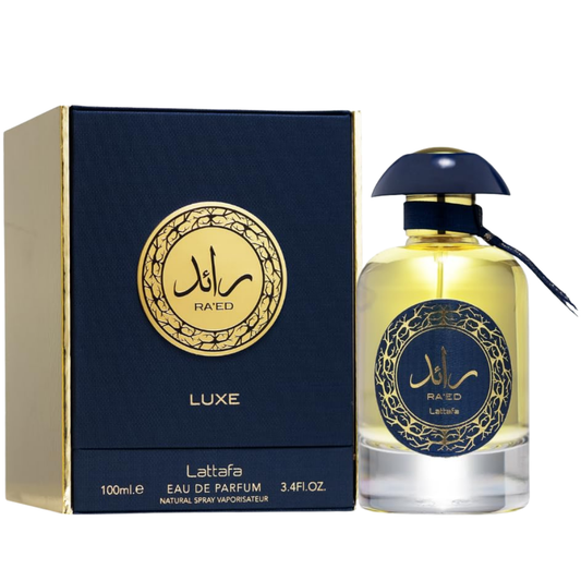 Lattaafa Raed perfume bottle and packaging on a white background. Lattafa Ra'ed Luxe Unisex Perfume