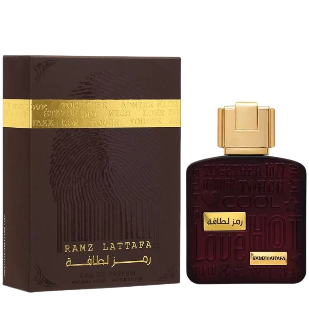 Ramz Lattafa perfume bottle and packaging on a white background. Lattafa Ramz Gold Unisex Perfume
