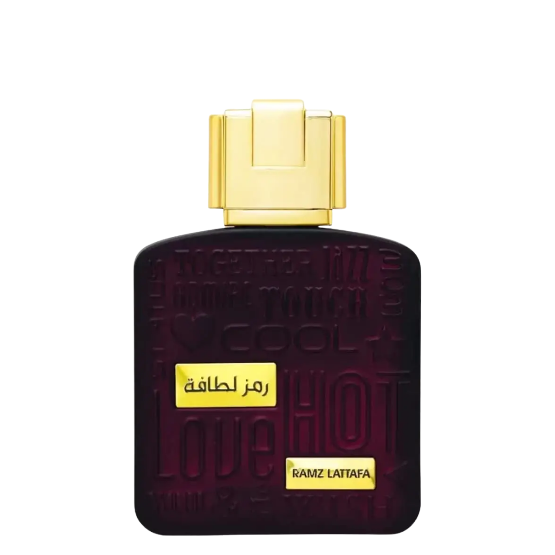 Perfume bottle with gold cap and text on a white background. Lattafa Ramz Gold Unisex Perfume