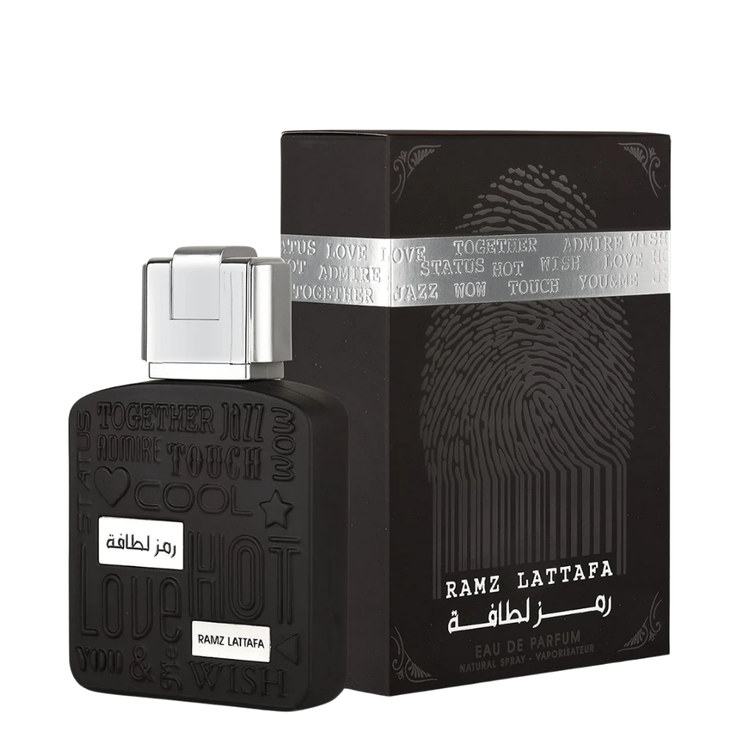 Black perfume bottle and packaging with 'RAMZ LATTafa' branding on a white background. Lattafa Ramz Silver Unisex Perfume