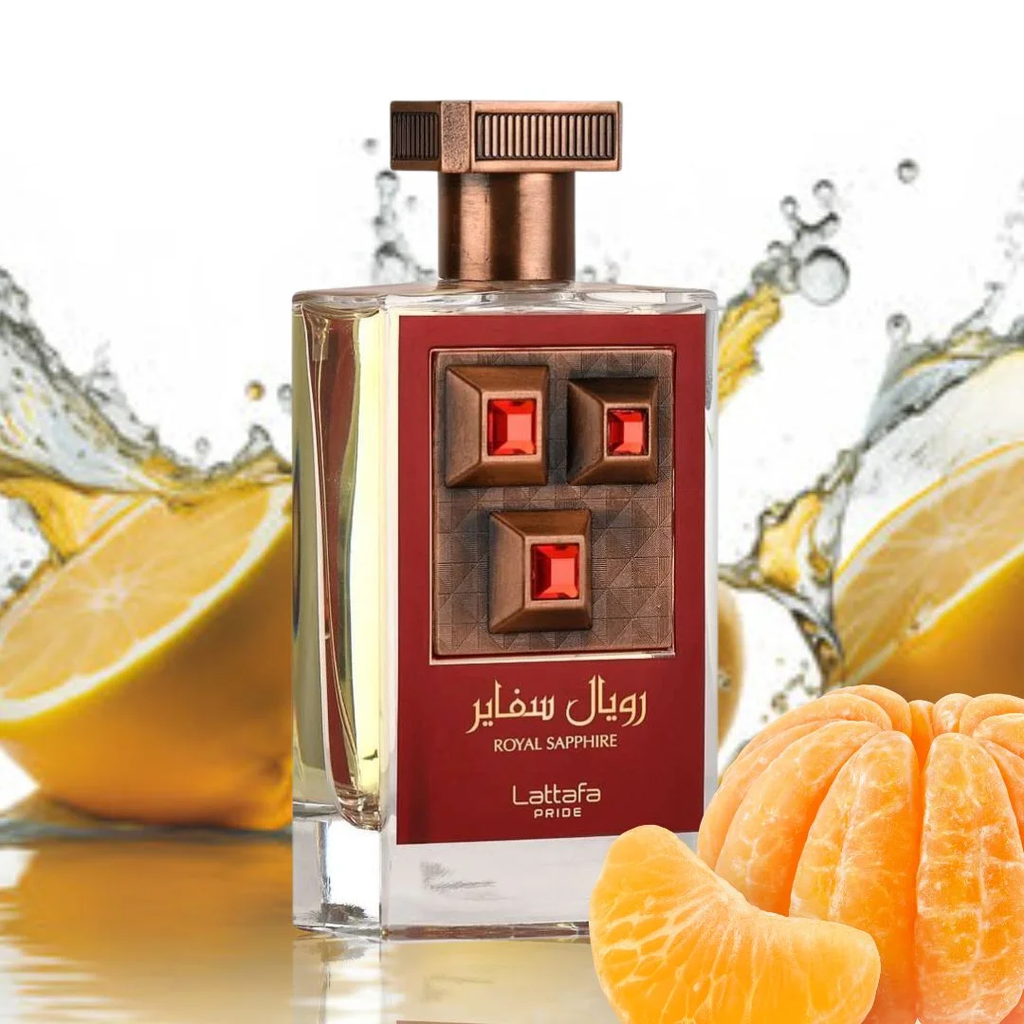 Perfume bottle with a red label featuring geometric design, surrounded by sliced  oranges. Lattafa Royal Sapphire Unisex Perfume