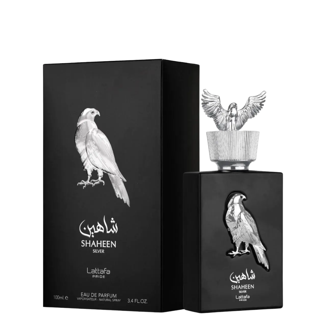 Shaheen Silver Eau de Parfum bottle and its matching black packaging box, both featuring a silver falcon illustration and a silver eagle cap on a white background.