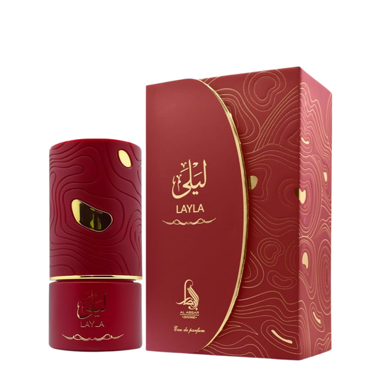 Red 'LAYLA' perfume bottle and packaging with gold accents on a white background