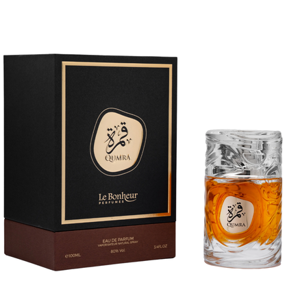 Qumra perfume bottle and packaging on a white background