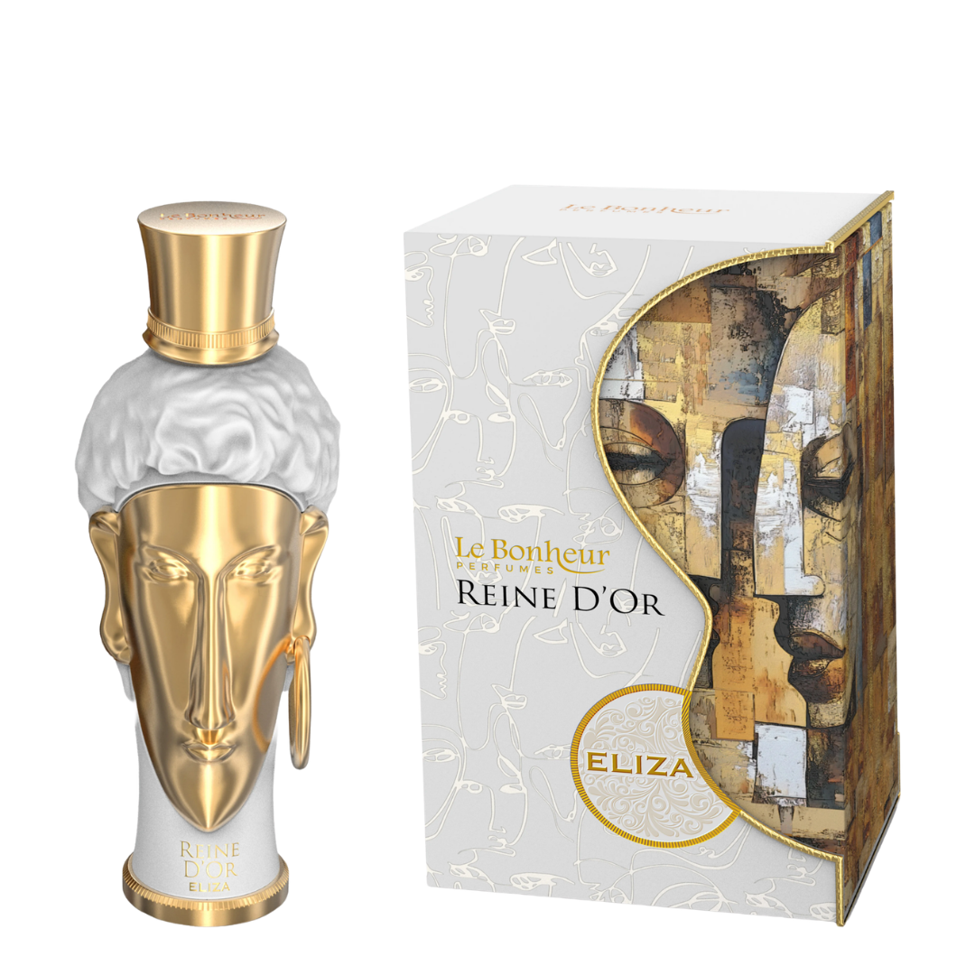 Eliza Reine D'Or perfume bottle and its packaging box. The bottle features a sculpted white head with a metallic gold face and a gold top hat cap.