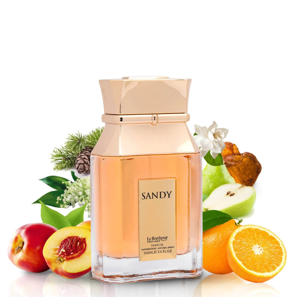 Perfume bottle labeled 'Sandy' surrounded by fruits and plants on a white background