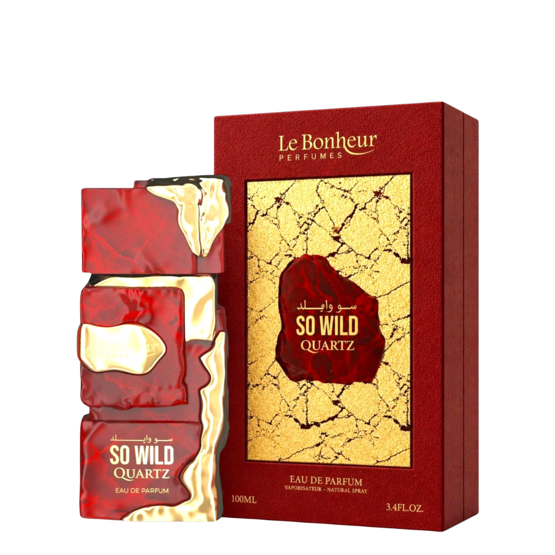 Le Bonheur Perfumes So Wild Quartz Eau de Parfum bottle and its red packaging box with gold cracked-glass style graphics, shown on a plain white background.