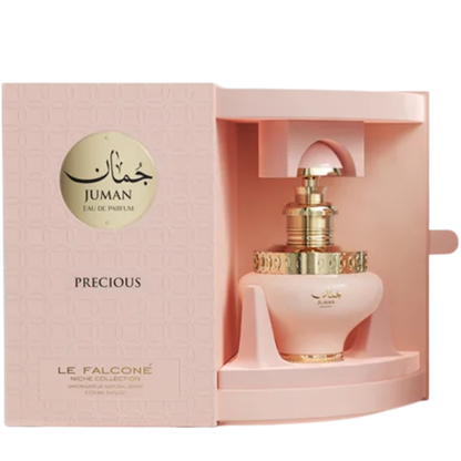 Juman perfume bottle in a pink box on a white background