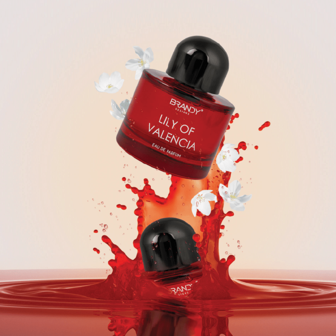 Brandy Eau de Parfum bottle with red liquid and white flowers on a beige background