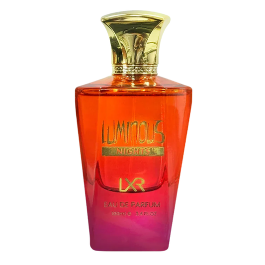 Perfume bottle with gold cap and gradient red to pink design on a white background. Luminous Night by LXR Womens Perfume