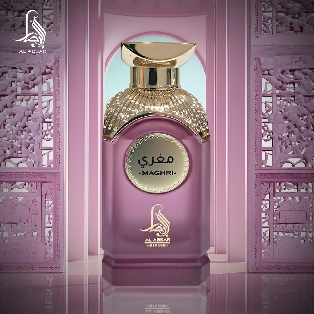 Pink and gold perfume bottle with 'Al Absar' branding against a decorative pink background