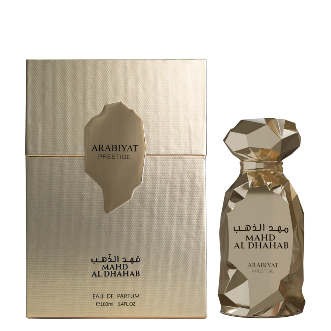 Perfume bottle and packaging with gold and beige design. Mahd Al Dhahab by Arabiyat Prestige Unisex Perfume