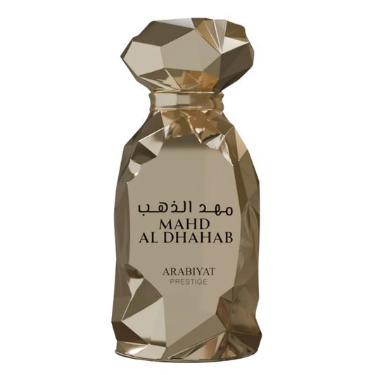 A glass perfume bottle with a faceted design, containing Mahd Al Dhahab fragrance by Arabiyat Prestige.