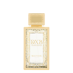 Maison Asrar DXB Jumeirah Eau de Parfum bottle, featuring a textured gold frame with a clear glass center and gold lettering, set against a plain white background.