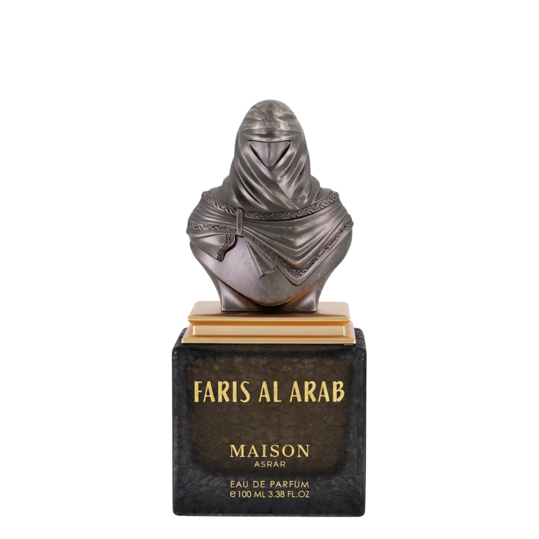 Maison Asrar Faris Al Arab Eau de Parfum, featuring a metallic bust of a veiled figure on a gold-plated base, set atop a black rectangular marble plaque with gold lettering.