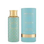 Maison Asrar Imperial Royal Collection Eau de Parfum bottle in light blue with gold trellis pattern and cap, shown next to its matching light blue cylindrical box with gold lettering on a white background.