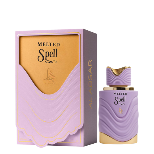 Perfume bottle and packaging of 'Melted Spell' by Al Absar on a white background