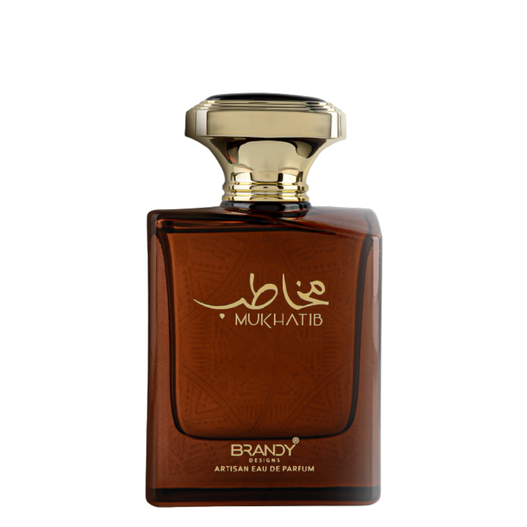 Brown perfume bottle with gold cap on a white background. Mukhatib by Brandy Designs Mens Perfume