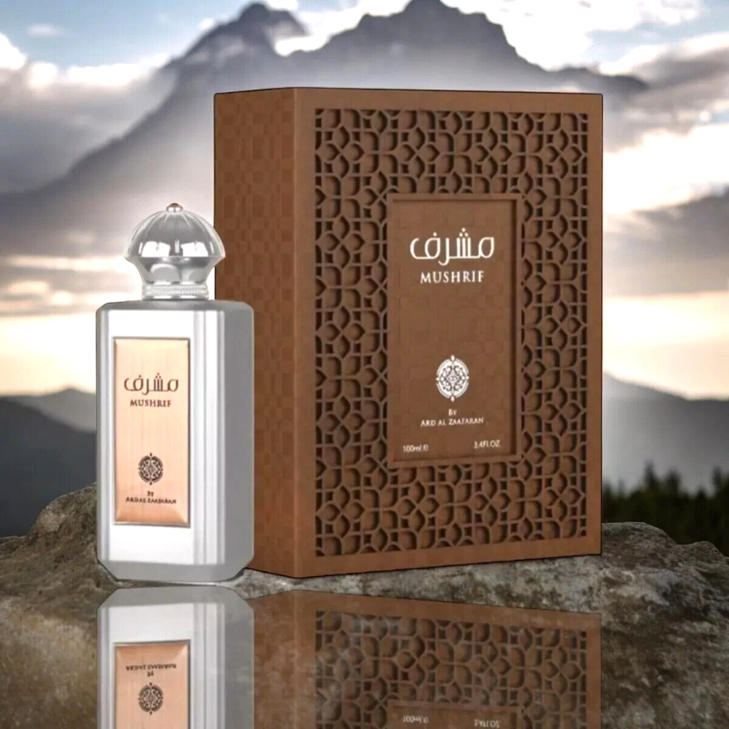 Mushrif perfume bottle and packaging with mountainous background