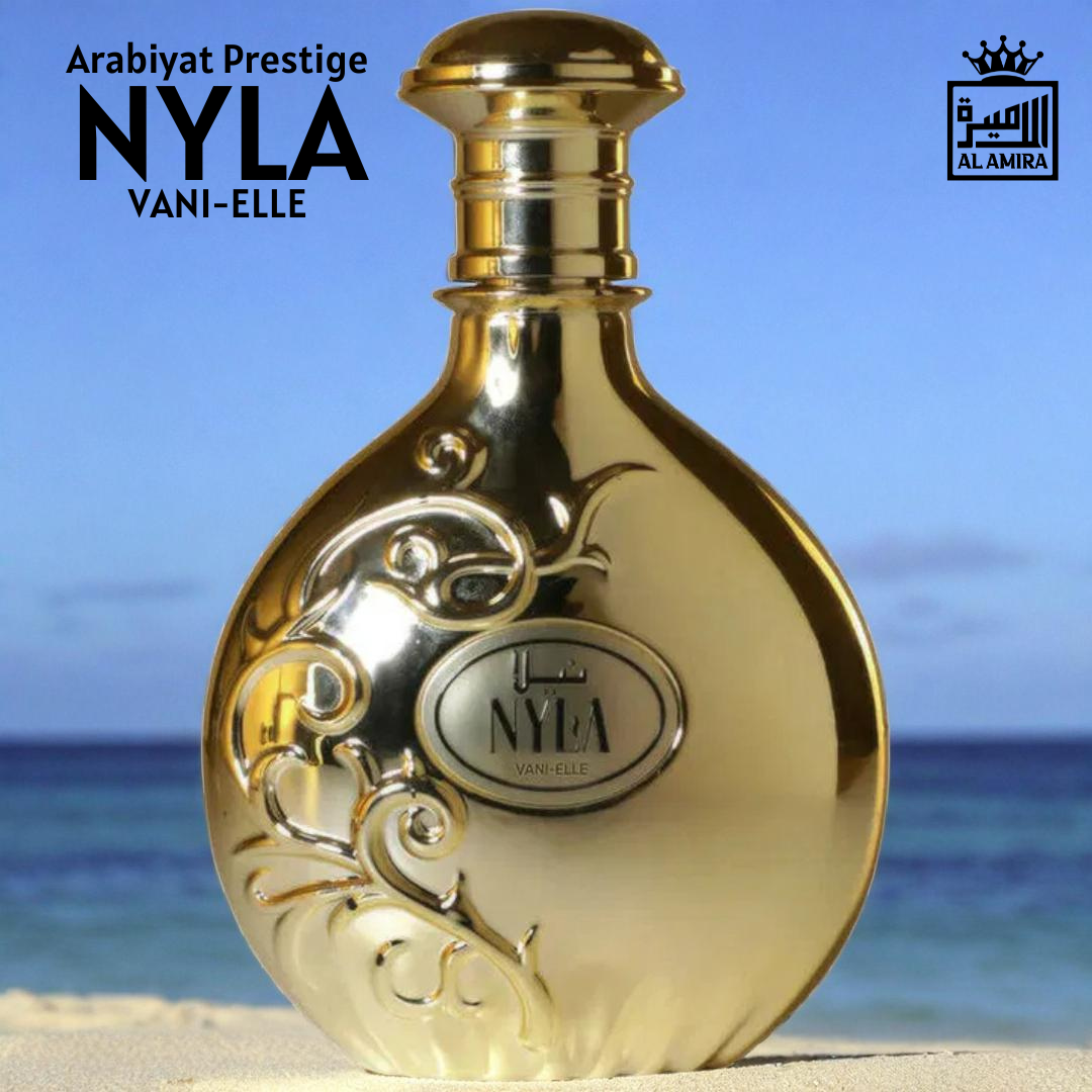 Nyla Vani-Elle by Arabiyat – Artistic product shot of gold perfume bottle on sandy beach with ocean backdrop, branded for Al Amira. 