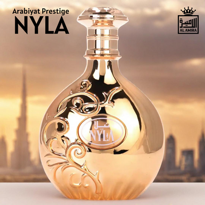 Nyla Eau de Parfum 80ml by Arabiyat Prestige – golden luxury perfume bottle with Dubai skyline at sunset. womens fragrance