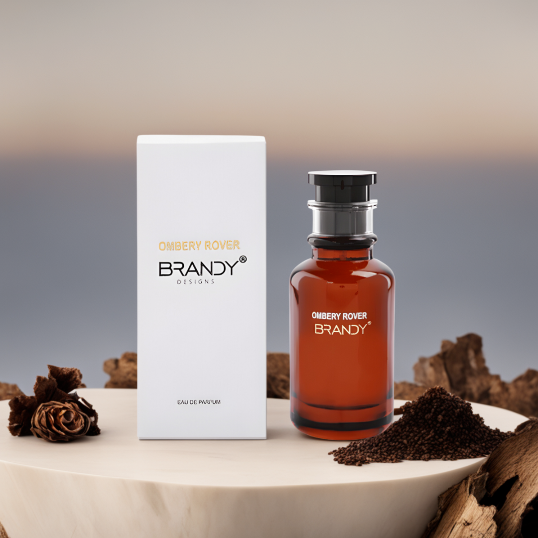 Luxury perfume Ombery Rover by Brandy Designs displayed with natural elements. A rich, long lasting men’s fragrance in the Arabian perfumes category, perfect for luxury fragrance lovers.