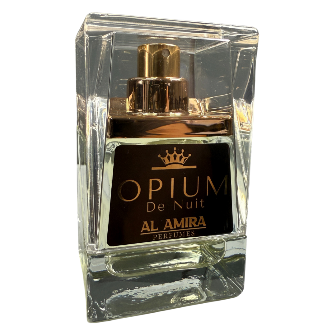 Perfume bottle labeled 'Opium De Nuit' by Al Amira on a white background