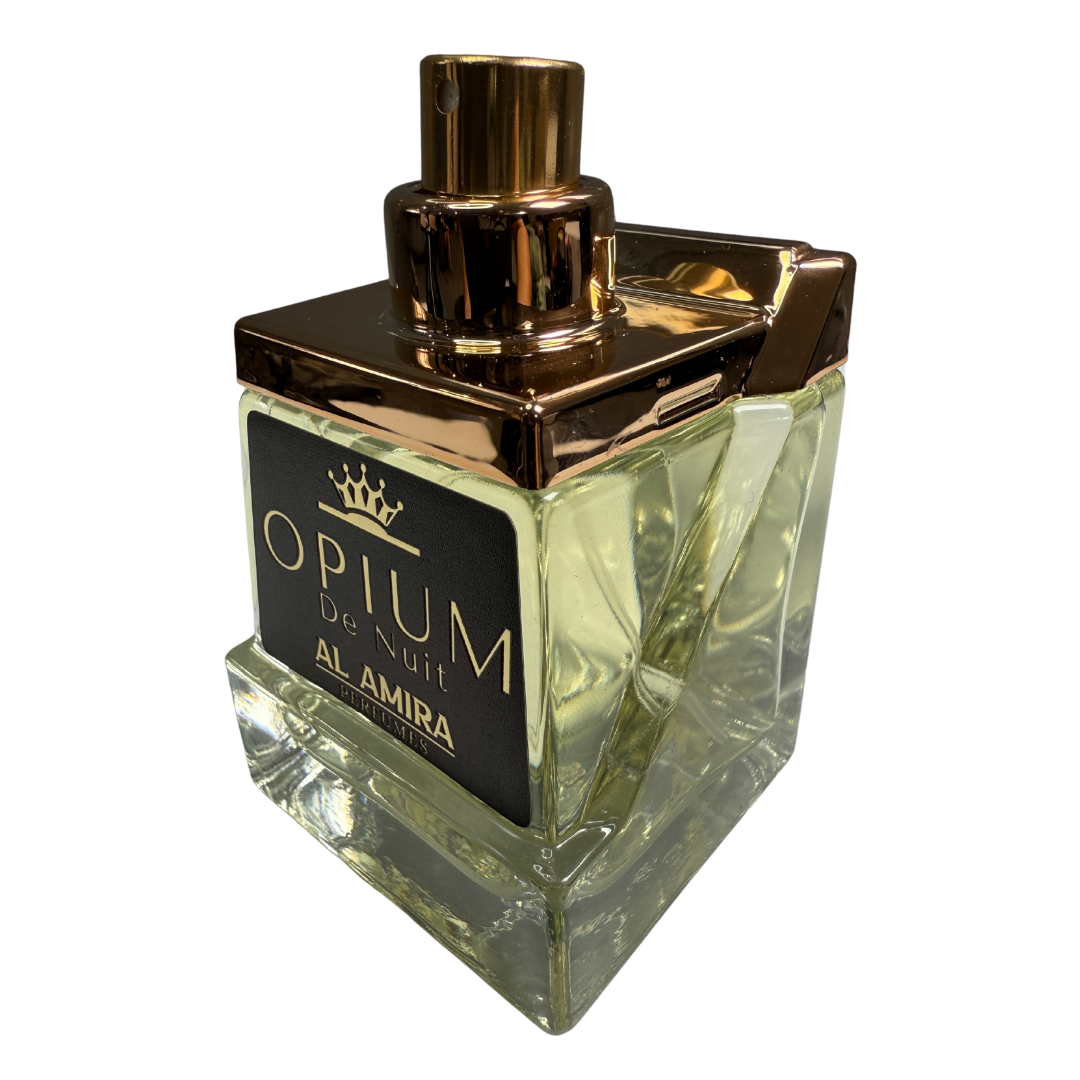 Perfume bottle labeled 'Opium de Nuit Al Amira' with gold cap on a white background