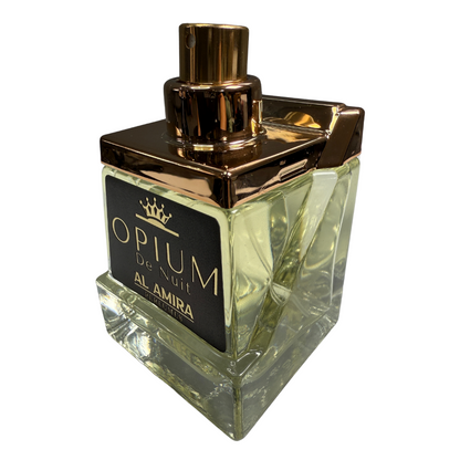 Perfume bottle labeled 'Opium de Nuit Al Amira' with gold cap on a white background