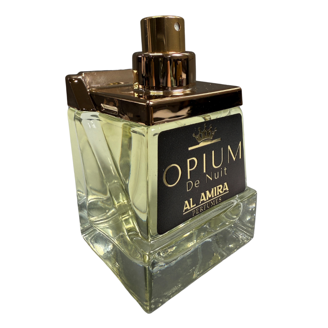 Perfume bottle labeled 'Opium De Nuit' by Al Amira on a white background