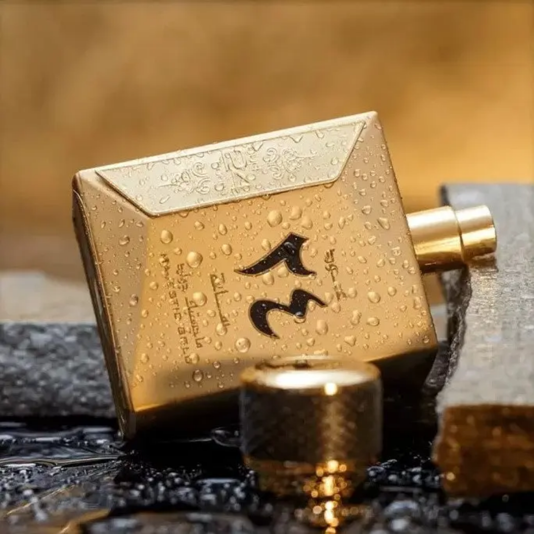 Gold perfume bottle with water droplets on a textured background. Oud 24 Hours Majestic Gold Unisex Perfume by Ard Al Zaafaran
