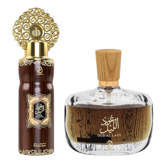 Two perfume bottles with decorative caps on a white background. Oud Al Layl Giftset by Arabiyat Unisex Perfume