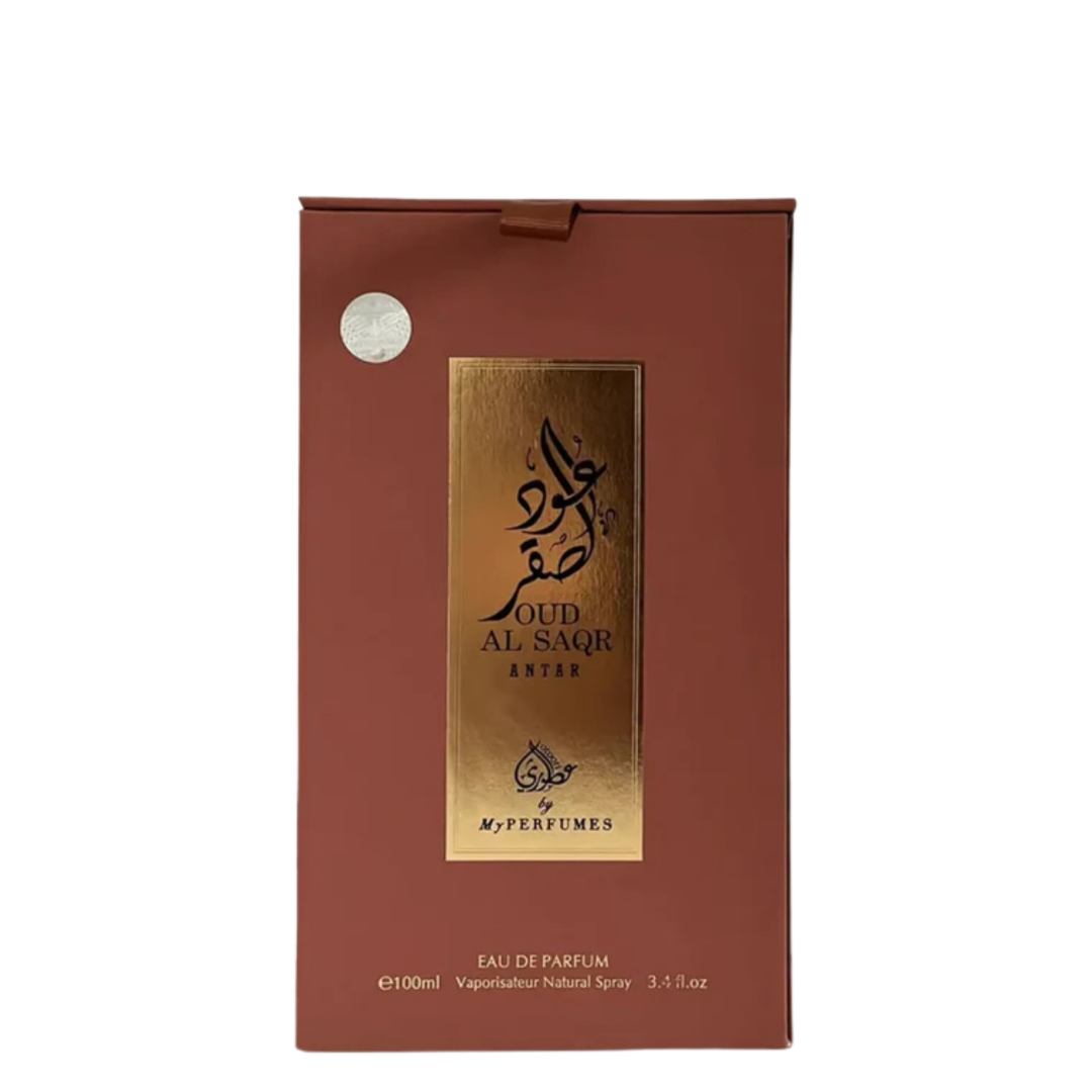 Brown and gold Oud Al Saqr Antar perfume packaging featuring Arabic calligraphy and luxury detailing.