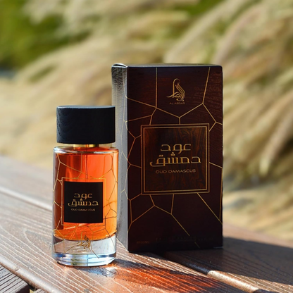 Perfume bottle and packaging on a wooden surface with a blurred natural background