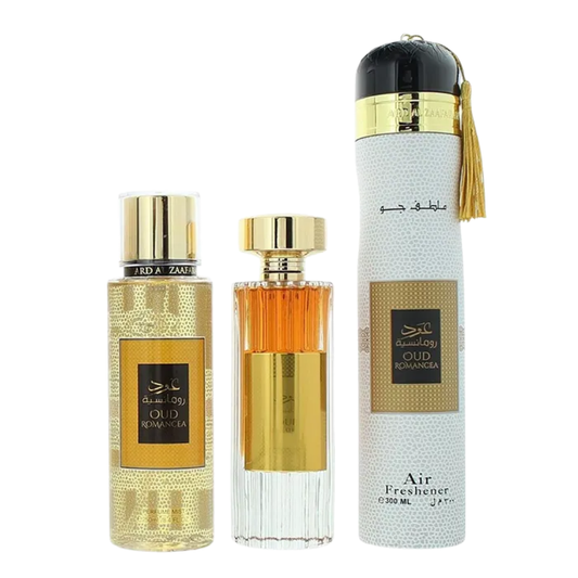 Three perfume bottles with gold and black labels on a white background. Oud Romancea Giftset by Ard Al Zaafaran Womens Perfume