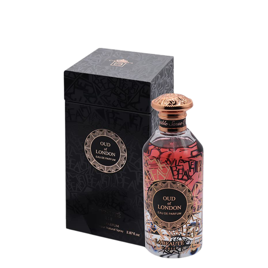 Perfume bottle with decorative label and black box on a white background. Oud of London by La Beaute Paris Unisex Perfume