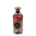 A bottle of Oud of London perfume with a colorful, decorated design and a gold-colored cap.