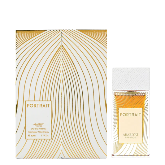 Arabiyat Prestige Portrait perfume bottle and packaging with gold and white design. Portrait by Arabiyat Prestige Unisex Perfume