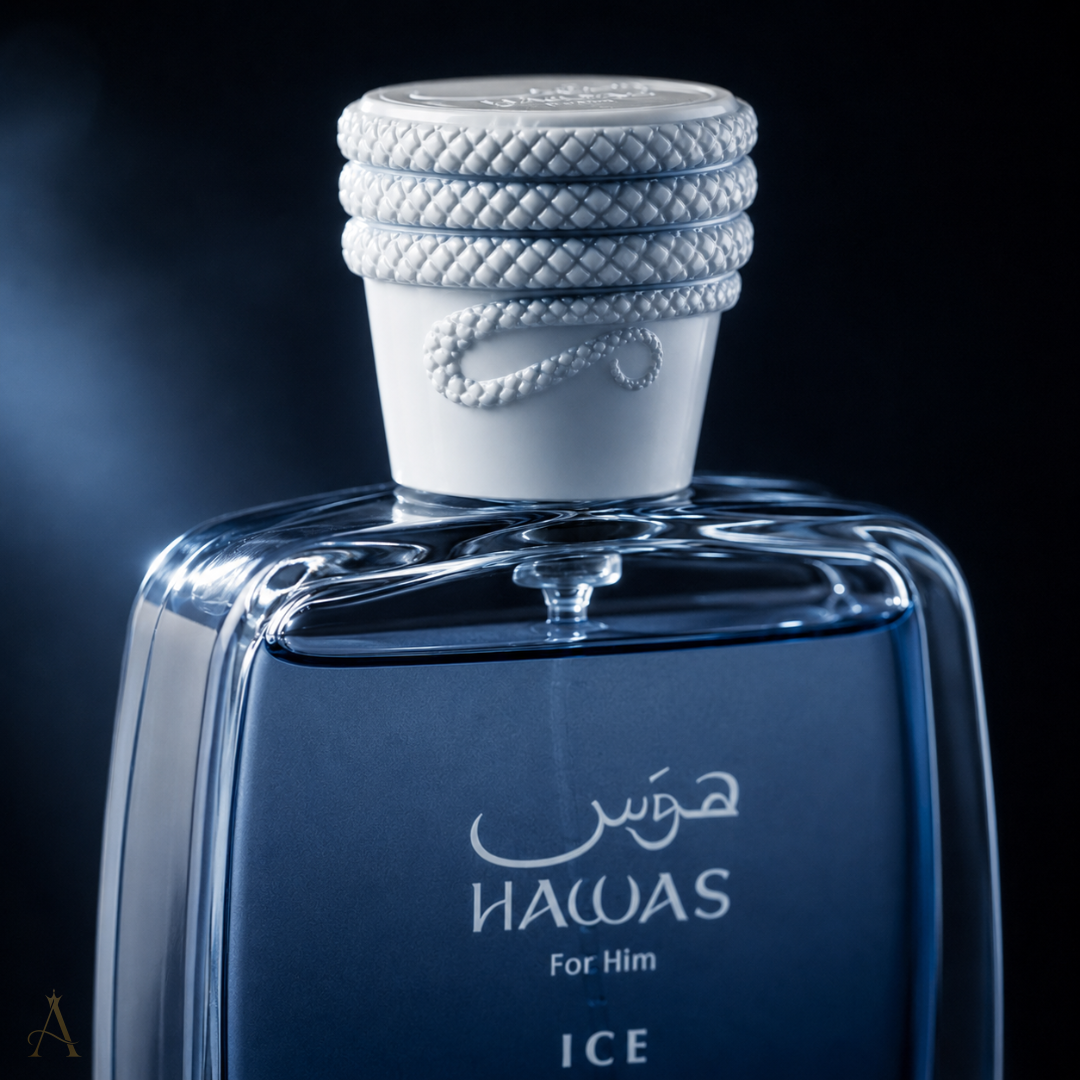 A close-up studio shot of a glass fragrance bottle labeled HAWAS For Him ICE, with a textured white cap and pale blue liquid against a dark background.