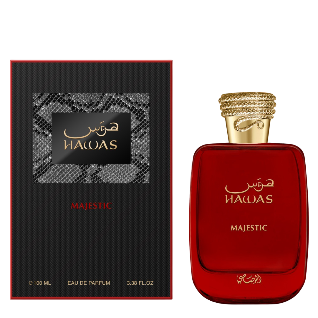 A bottle of Rasasi Hawas Majestic Eau de Parfum next to its black packaging box with red trim and a gray snakeskin pattern. The bottle is a deep translucent red with a textured gold cap, and the box features the brand name 'HAWAS' in gold Arabic script and English text.