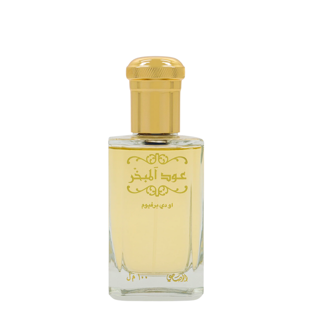 Perfume bottle with gold cap and clear body on a white background. Rasasi Oud Al Mubakhar Unisex Perfume