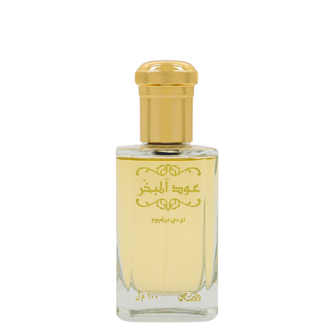 Perfume bottle with gold cap and clear body on a white background. Rasasi Oud Al Mubakhar Unisex Perfume