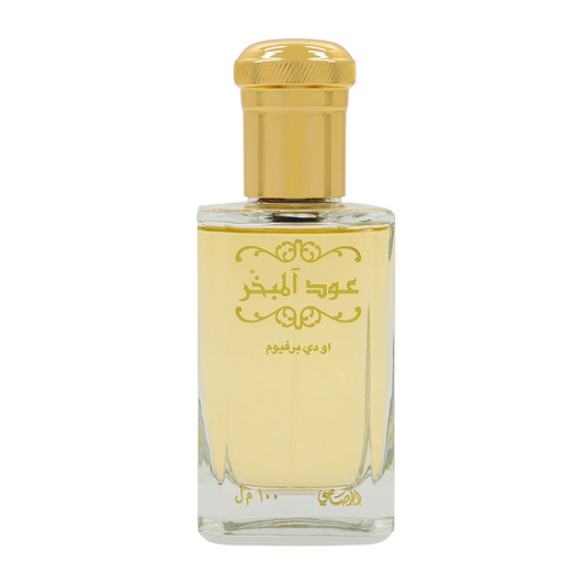 Perfume bottle with gold cap and clear body on a white background. Rasasi Oud Al Mubakhar Unisex Perfume